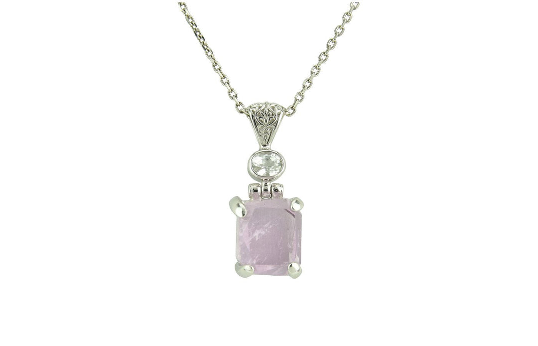Kunzite crystal gemstone pendant with rectangular soft pink stone and round accent in silver setting
