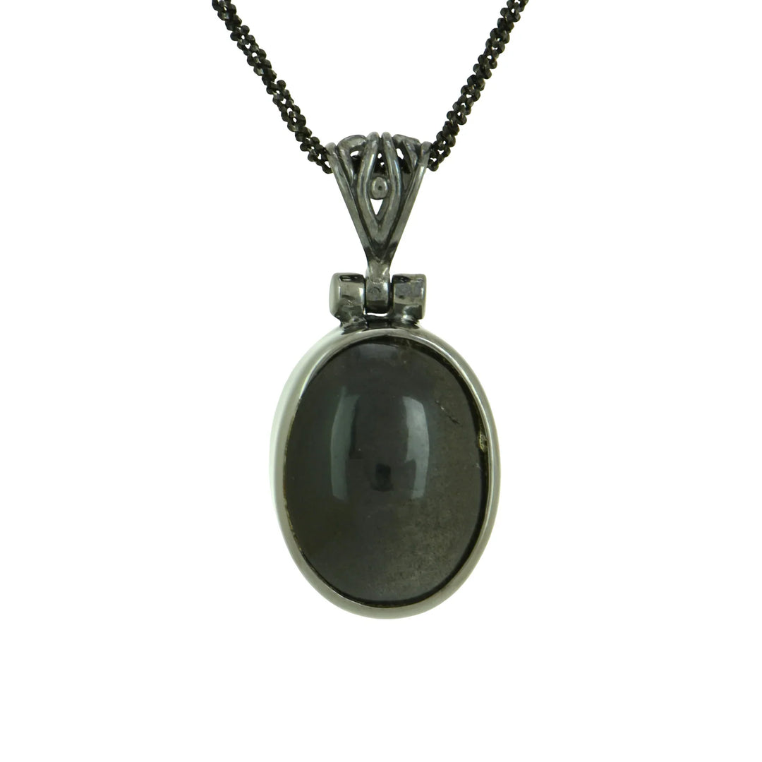 cats eye scapolite crystal gemstone pendant
