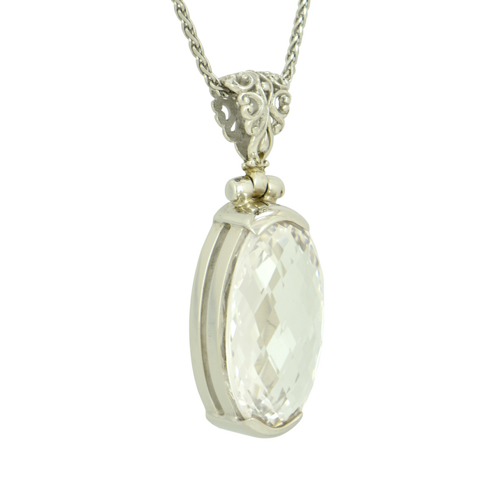 White Sapphire Pendant, set in Sterling Silver plated in White Rhodium