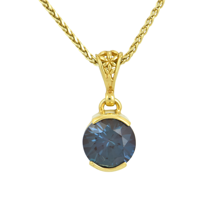 Alexandrite Chrysoberyl, Round Cut, set in Sterling Silver plated in Yellow Gold