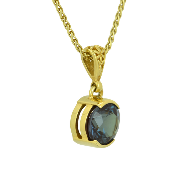 Alexandrite Chrysoberyl, Round Cut, set in Sterling Silver plated in Yellow Gold