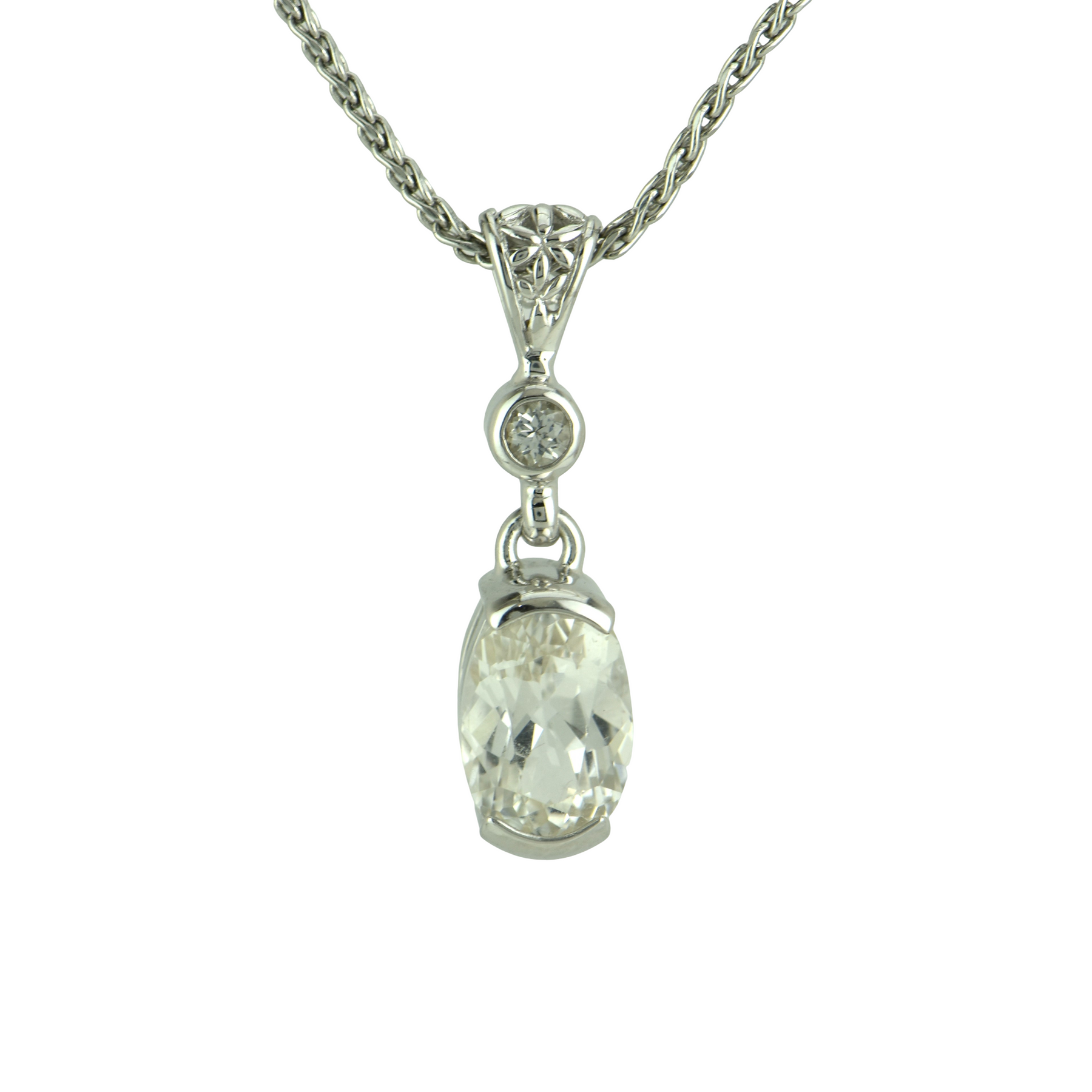 Phenakite pendant in sterling silver, a rare crystal of high vibration and light codes that supports spiritual awakening, meditation, and higher consciousness.