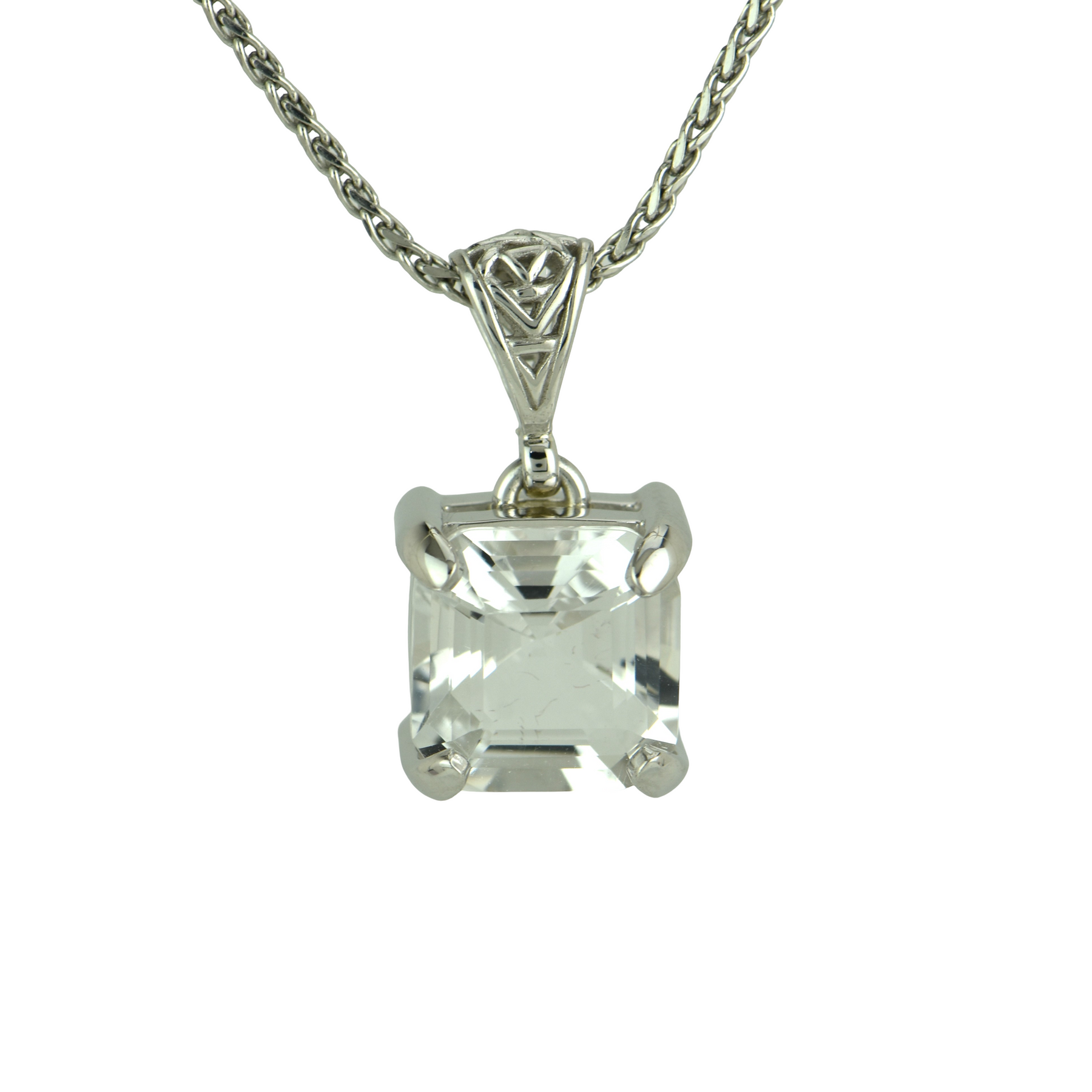 Square cut petalite pendant set in a four-prong sterling silver setting with a filigree bail on a wheat chain