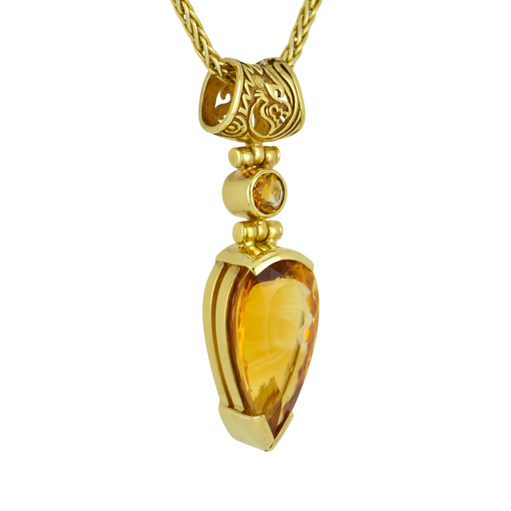 Pear Cut Citrine Pendant, set in Sterling Silver plated in Yellow Gold