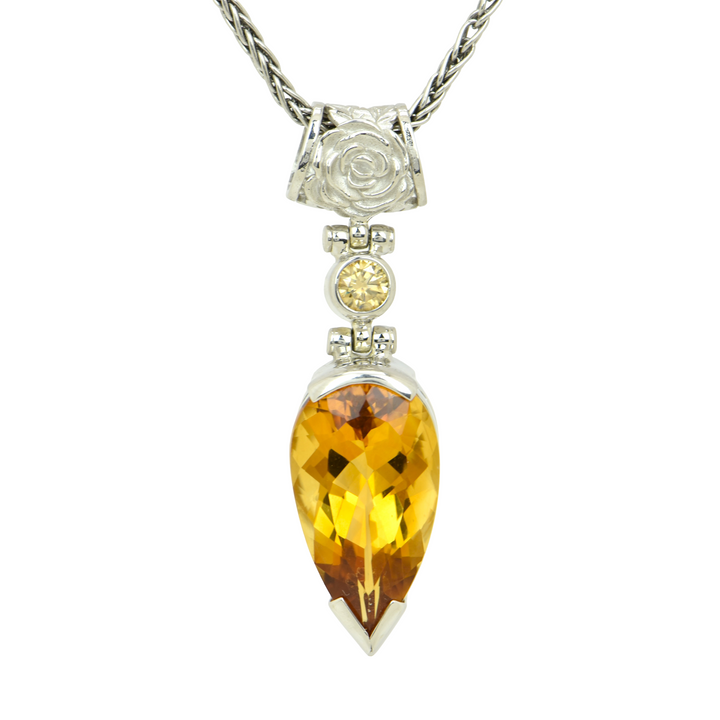 Pear Cut Citrine Pendant, set in Sterling Silver plated in White Rhodium