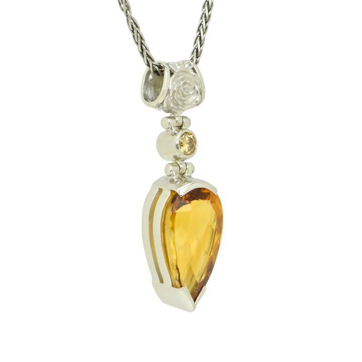 Pear Cut Citrine Pendant, set in Sterling Silver plated in White Rhodium