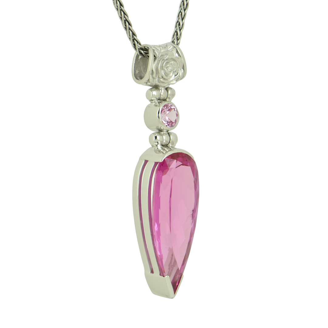Pear Cut Shasta Pink Sapphire Pendant, set in Sterling Silver plated in White Rhodium