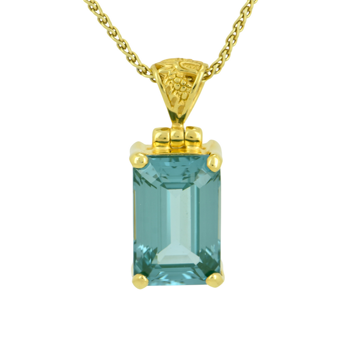 Emerald Cut Paraiba Effect Spinel Pendant, set in Sterling Silver plated in Yellow Gold