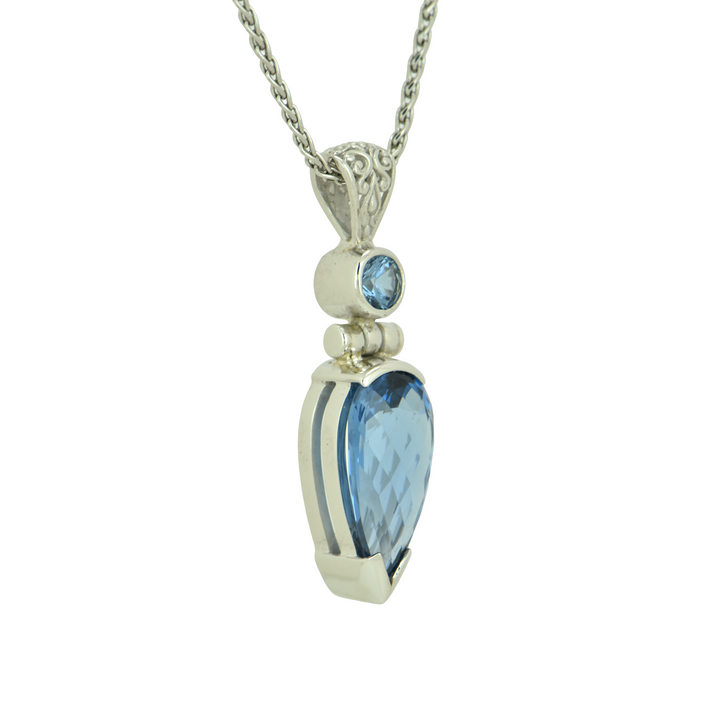 Pear Cut Blue Green Spinel, set in Sterling Silver plated in White Rhodium