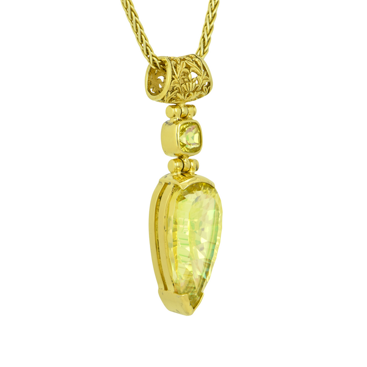 Pear Cut Amaterasu Mystic Quartz Pendant, set in Sterling Silver plated in Yellow Gold