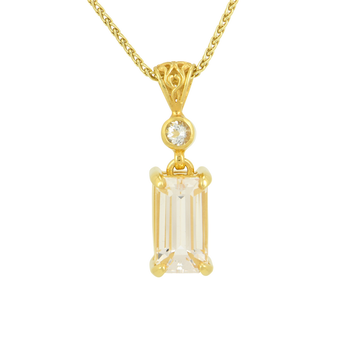 Emerald Cut Danburite Pendant, set in Sterling Silver plated in Yellow Gold