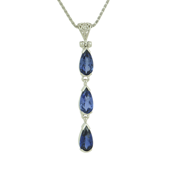 Pear Cut Blue Sapphire Pendant, set in Sterling Silver plated in White Rhodium