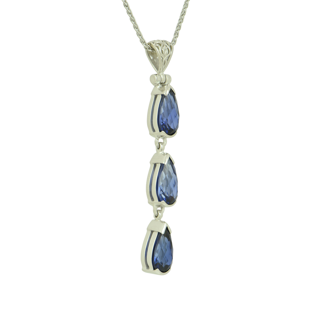 Pear Cut Blue Sapphire Pendant, set in Sterling Silver plated in White Rhodium