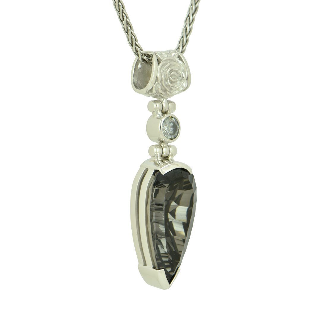 Pear Cut Midnight Mystic Quartz Pendant, set in Sterling Silver plated in White Rhodium