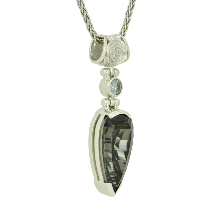 Pear Cut Midnight Mystic Quartz Pendant, set in Sterling Silver plated in White Rhodium