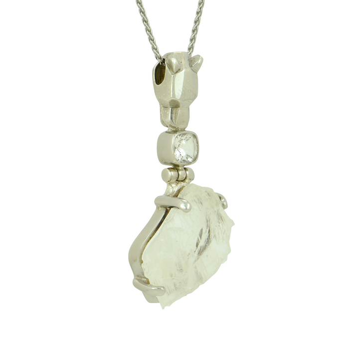 Raw Cut Petalite Pendant, set in Sterling Silver plated in White Rhodium