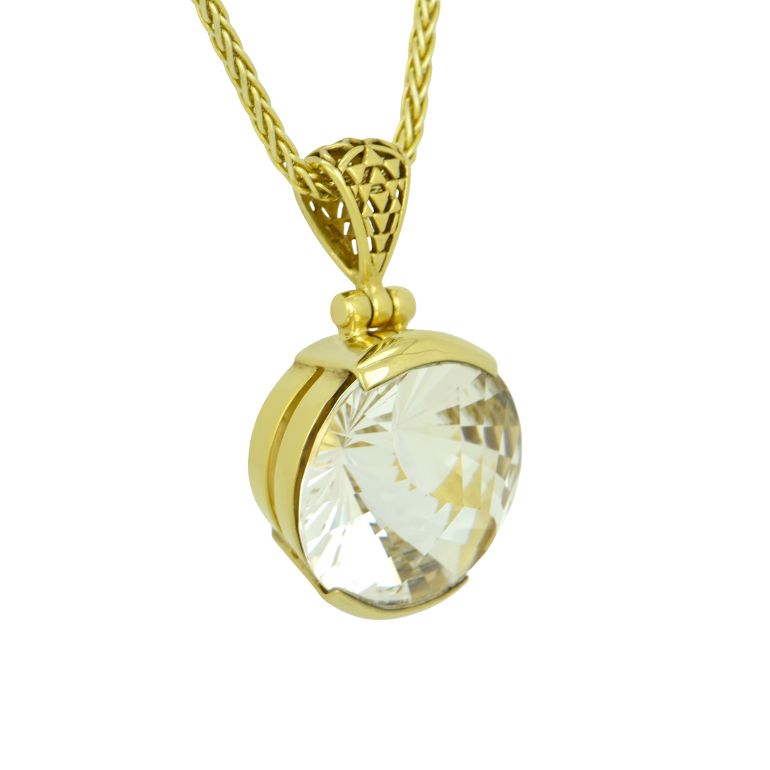 Round White Sapphire Pendant, set in Sterling Silver plated in Yellow Gold