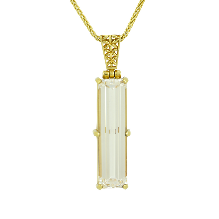 Emerald Cut White Sapphire Pendant, set in Sterling Silver plated in Yellow Gold