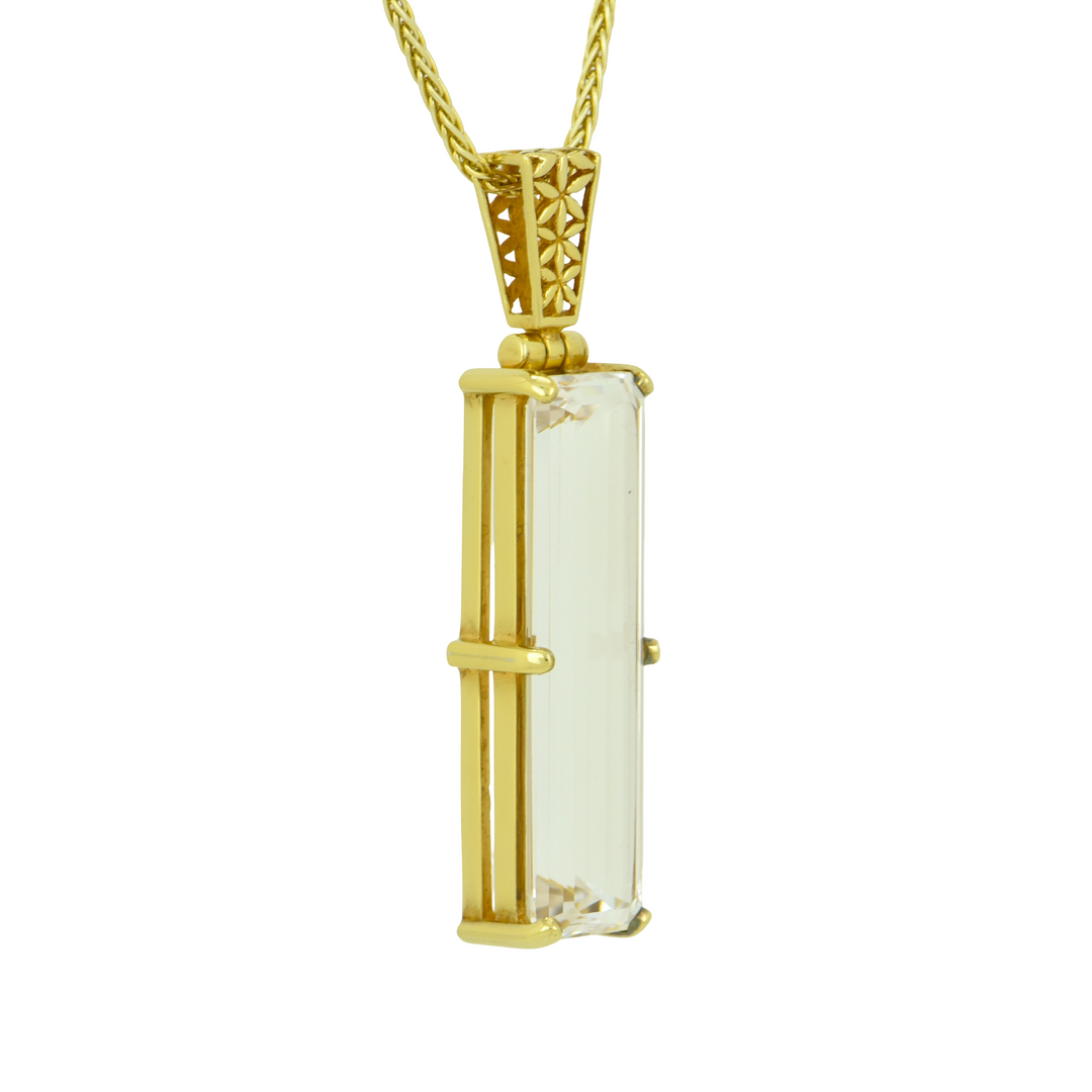 Emerald Cut White Sapphire Pendant, set in Sterling Silver plated in Yellow Gold