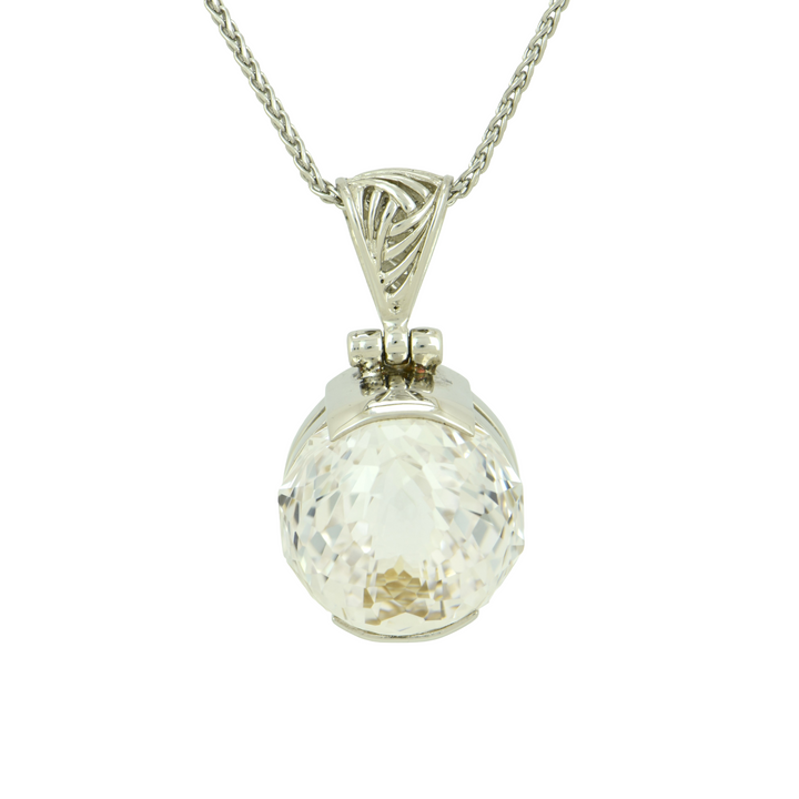 Round White Sapphire Pendant, set in Sterling Silver plated in White Rhodium