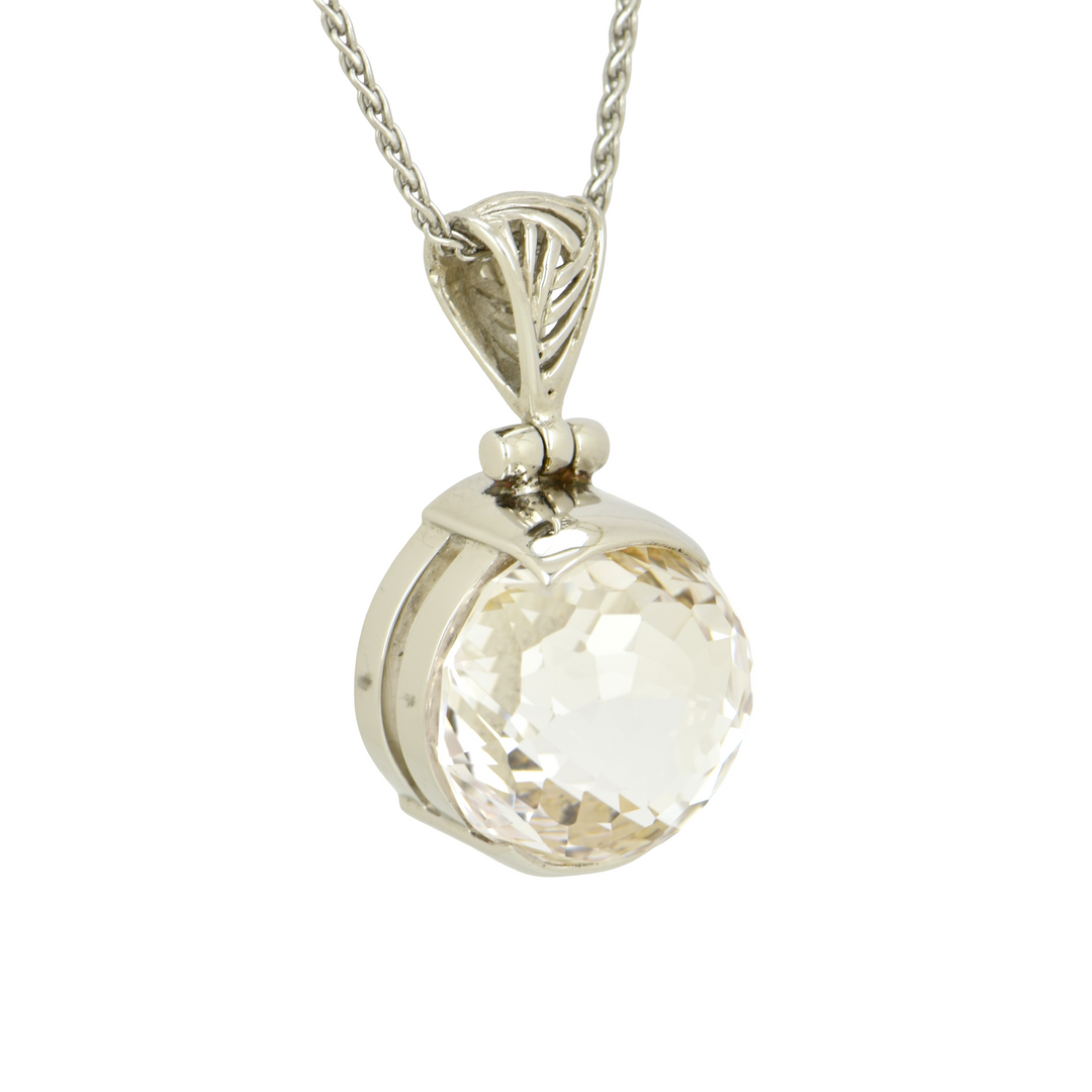 Round White Sapphire Pendant, set in Sterling Silver plated in White Rhodium