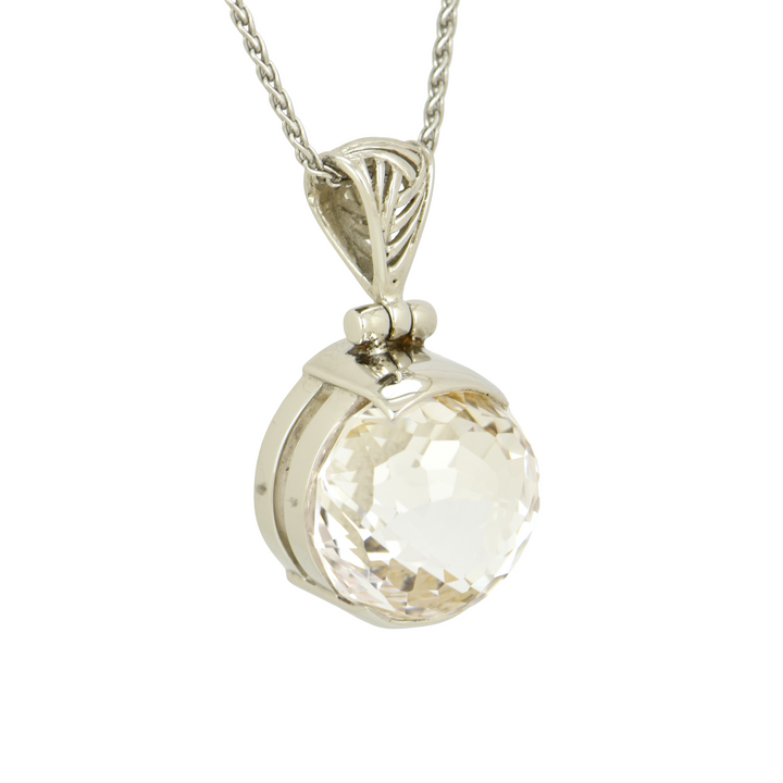 Round White Sapphire Pendant, set in Sterling Silver plated in White Rhodium