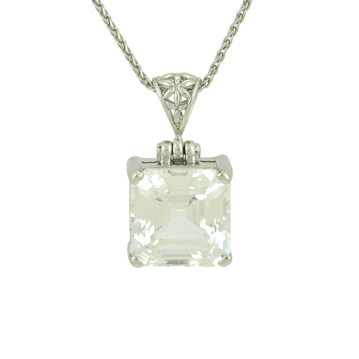 White Sapphire Pendant, set in Sterling Silver plated in White Rhodium