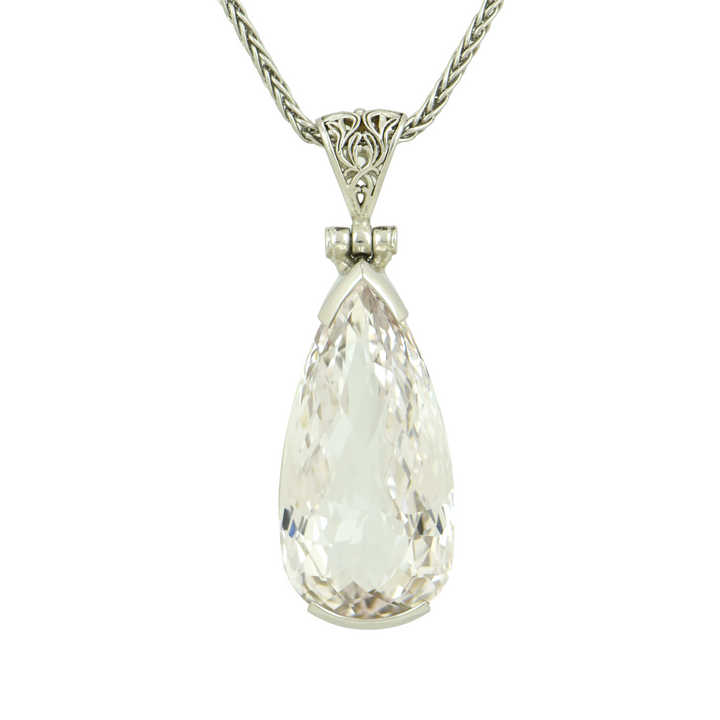 Pear Cut White Sapphire Pendant, set in Sterling Silver plated in White Rhodium