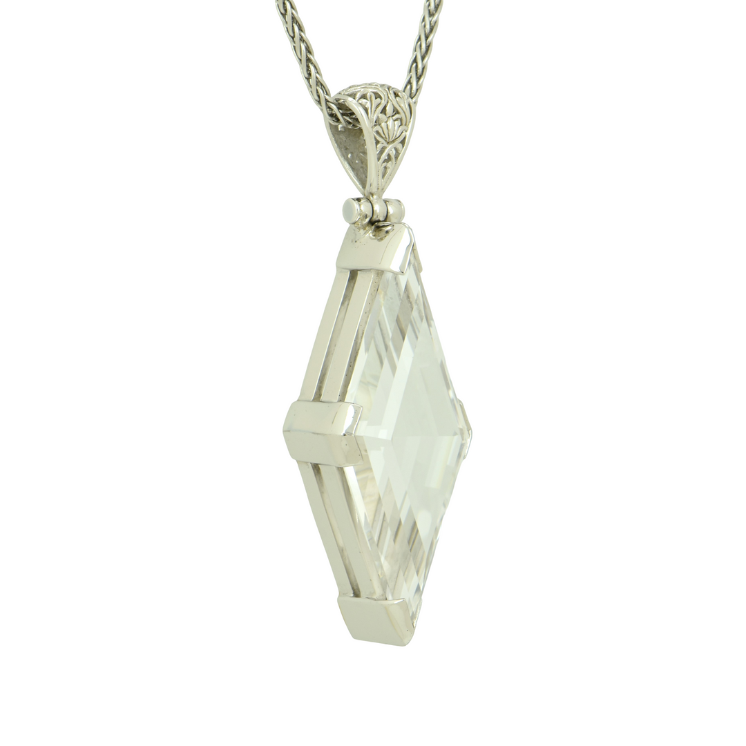 White Sapphire Pendant, set in Sterling Silver plated in White Rhodium