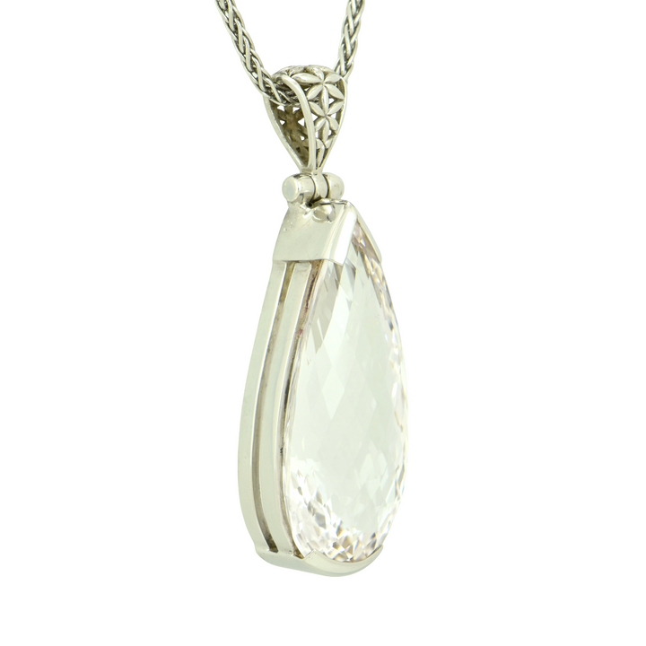 Pear Cut White Sapphire Pendant, set in Sterling Silver plated in White Rhodium