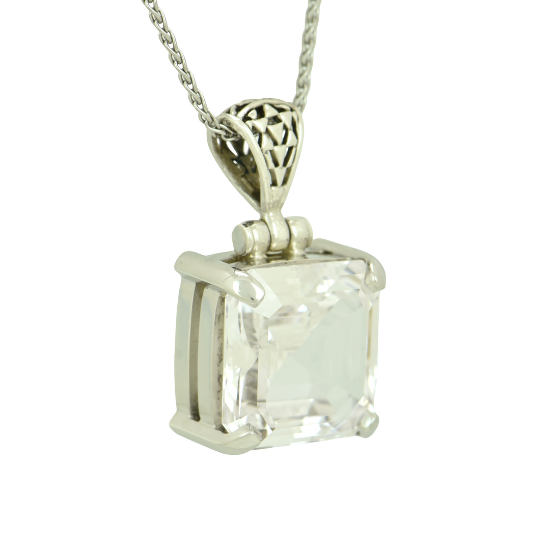 White Sapphire Pendant, set in Sterling Silver plated in White Rhodium