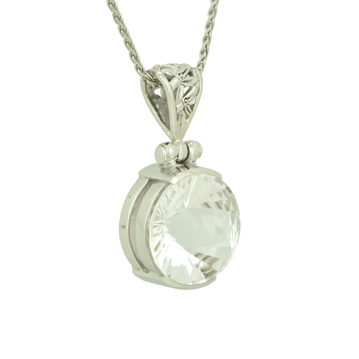 Round White Sapphire Pendant, set in Sterling Silver plated in White Rhodium