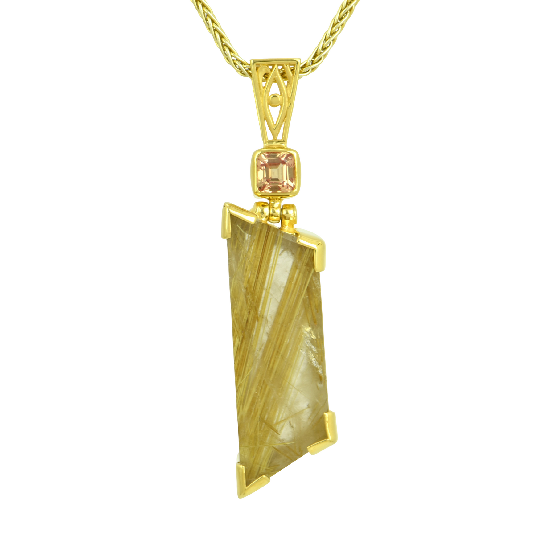 Golden rutilated quartz pendant in gold setting designed to support a blocked sacral chakra and encourage balanced energy.