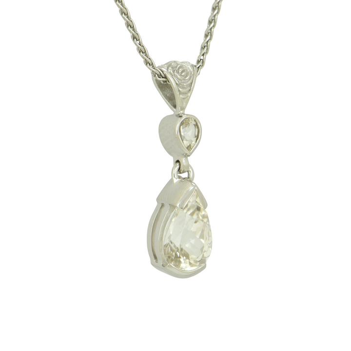 Phenakite Pendant, Pear Cut, set in Sterling Silver plated in White Rhodium