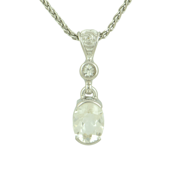 Oval Phenakite Pendant, Oval Cut, set in Sterling Silver plated in White Rhodium