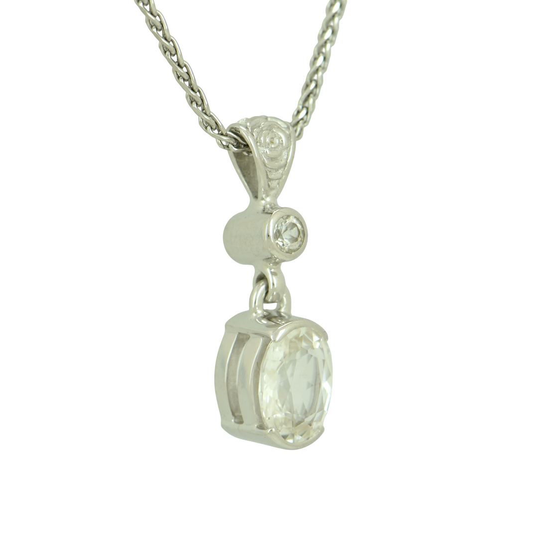 Oval Phenakite Pendant, Oval Cut, set in Sterling Silver plated in White Rhodium