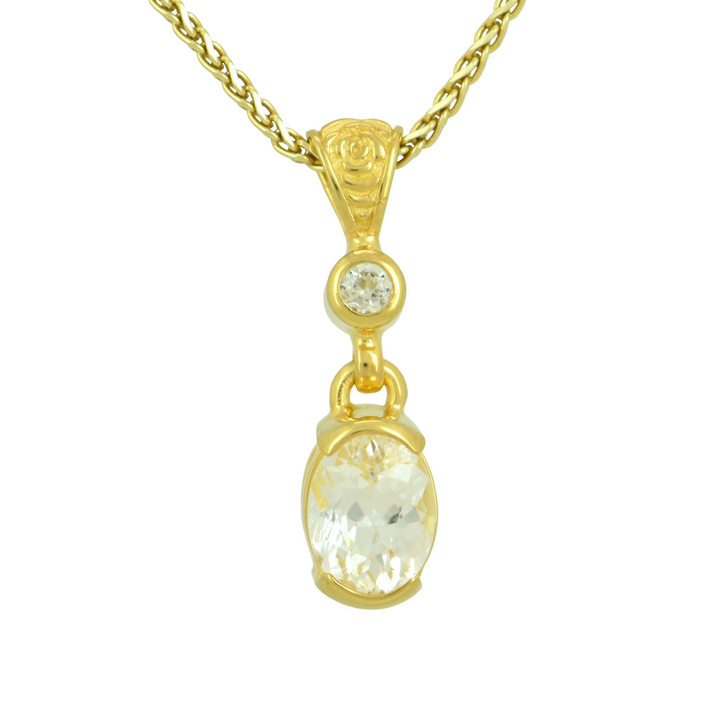 Phenakite Pendant, Oval Cut, set in Sterling Silver plated in Yellow Gold