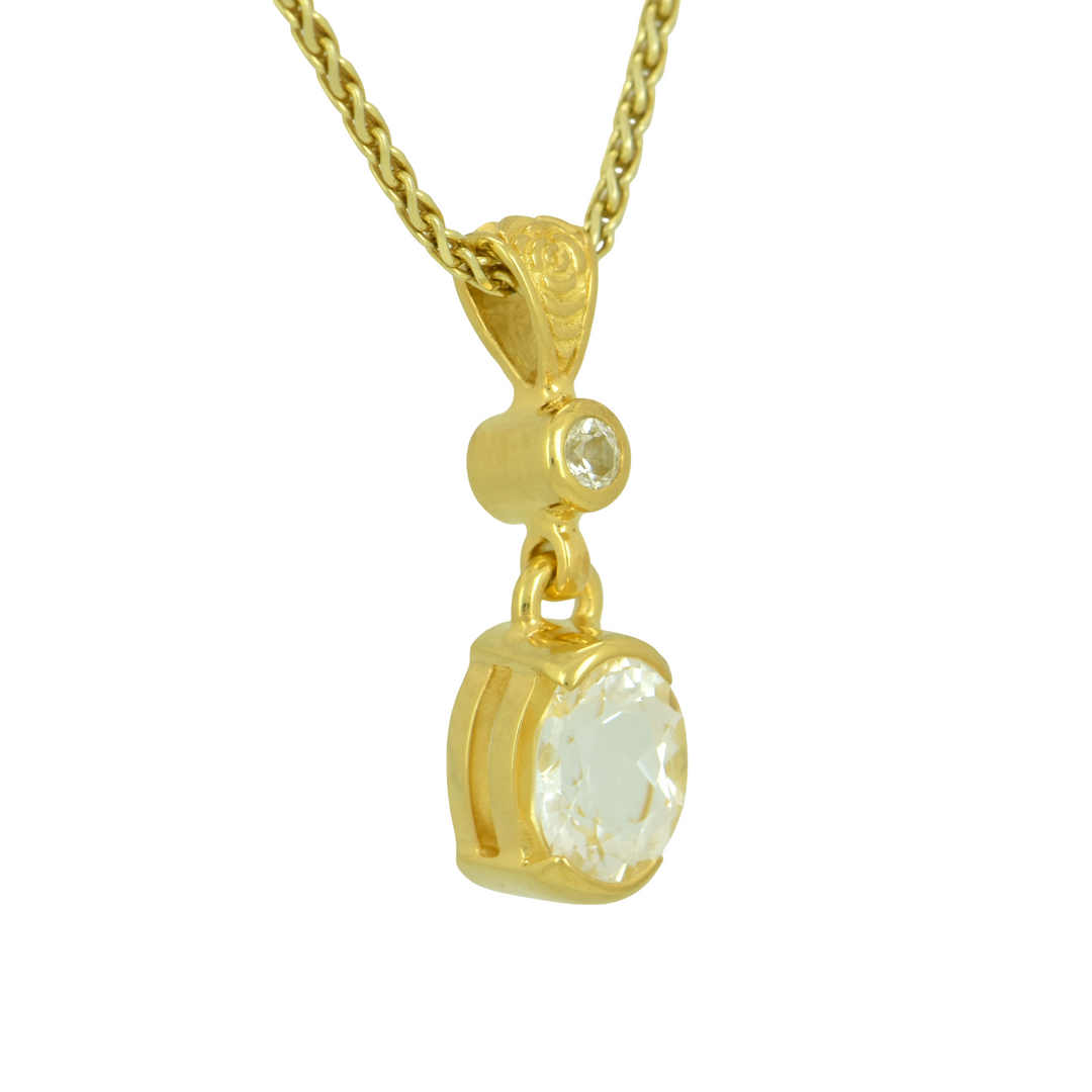 Phenakite Pendant, Oval Cut, set in Sterling Silver plated in Yellow Gold