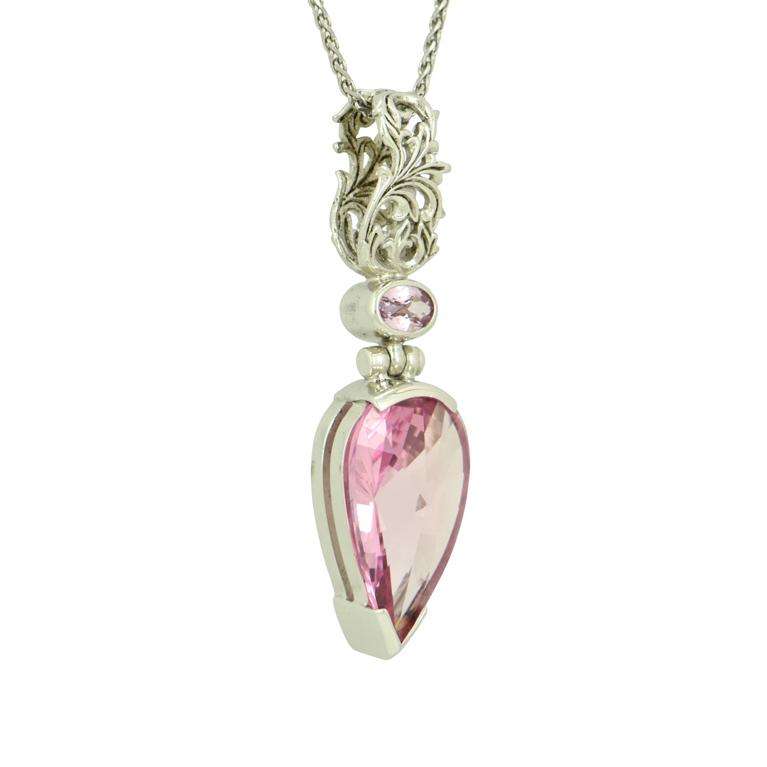 Imperial Pink Sapphire Pendant, Pear Yin Yang Cut, set in Sterling Silver plated in White Rhodium