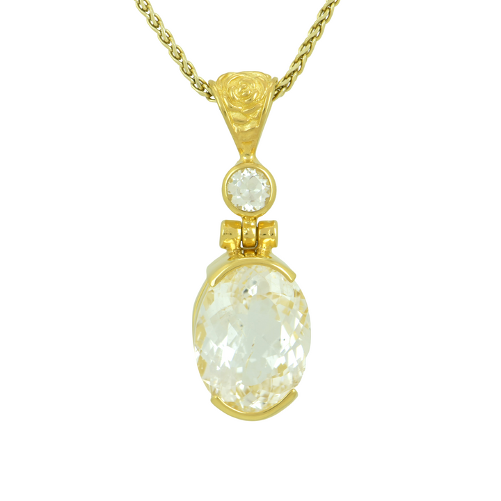 Phenakite Pendant, Oval Cut, set in Sterling Silver plated in Yellow Gold