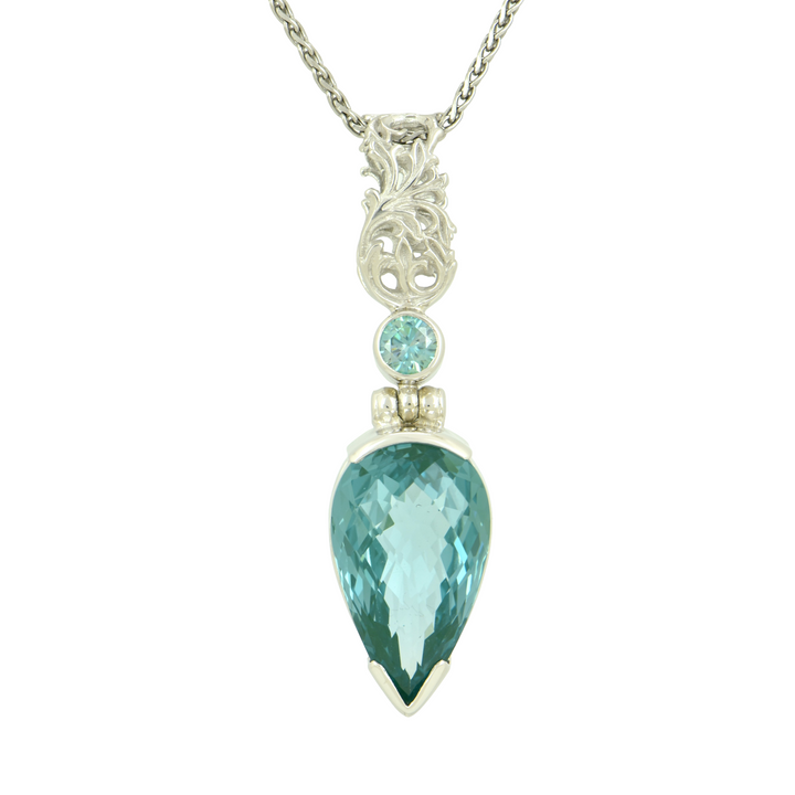 Paraiba Effect Spinel Pendant, Pear Cut, set in Sterling Silver plated in White Rhodium
