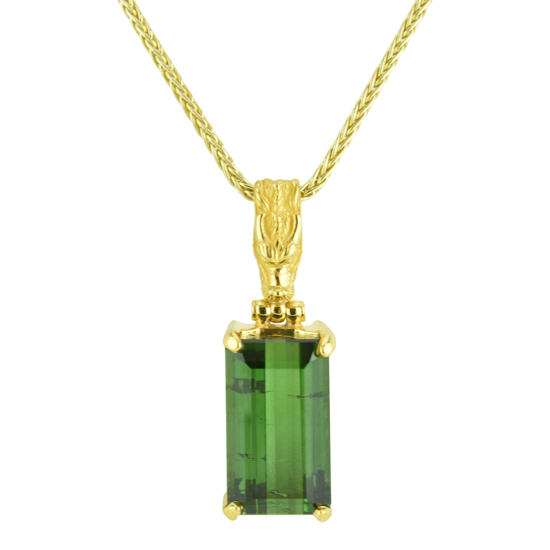 Faceted green tourmaline pendant from Kate King Jewellery symbolizing growth, balance, and intentional forward movement.