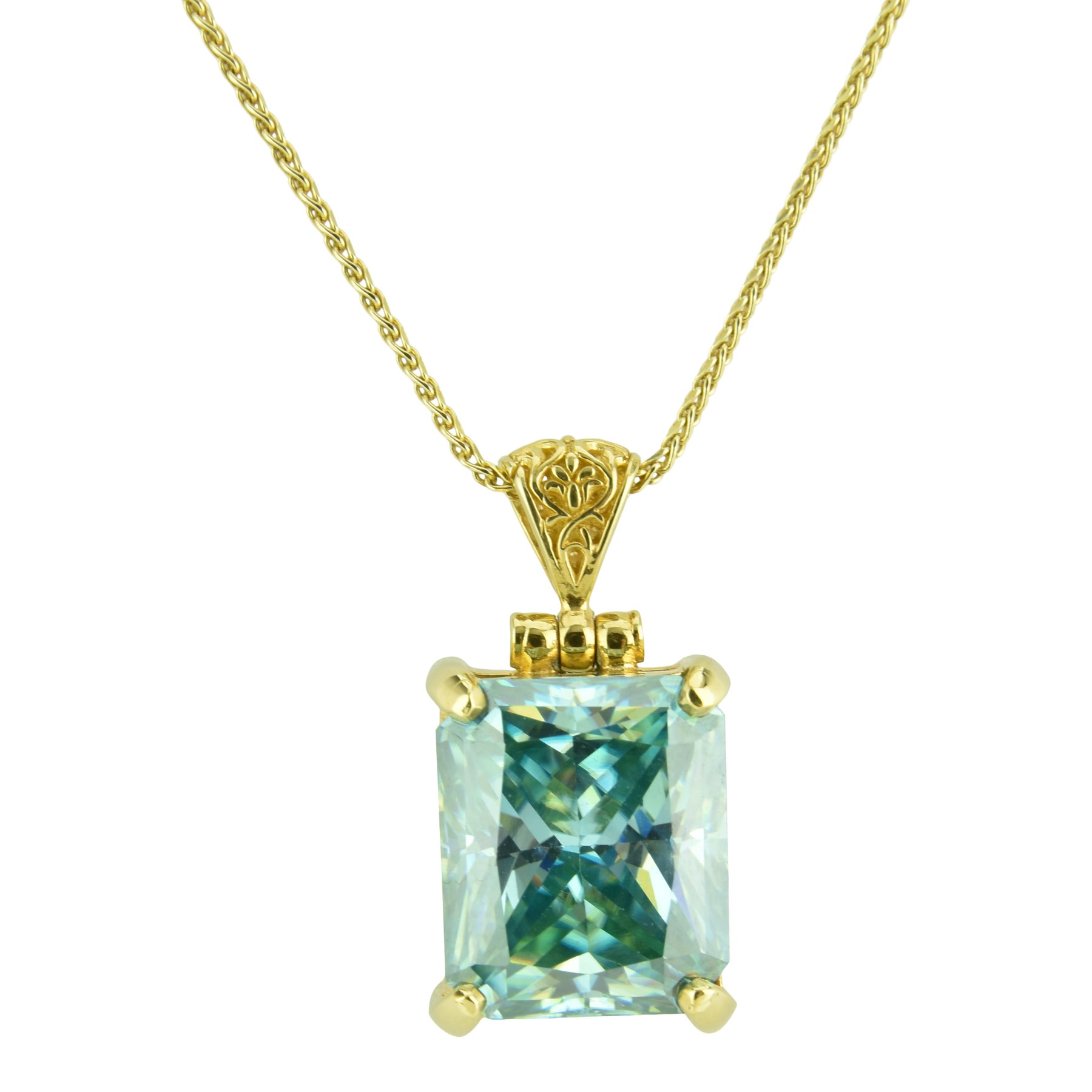 Radiant cut blue moissanite pendant jewelry piece with colour not naturally occurring, clarity under 10x magnification, and qualities linked to color grading, ethical sourcing, and gia certification.