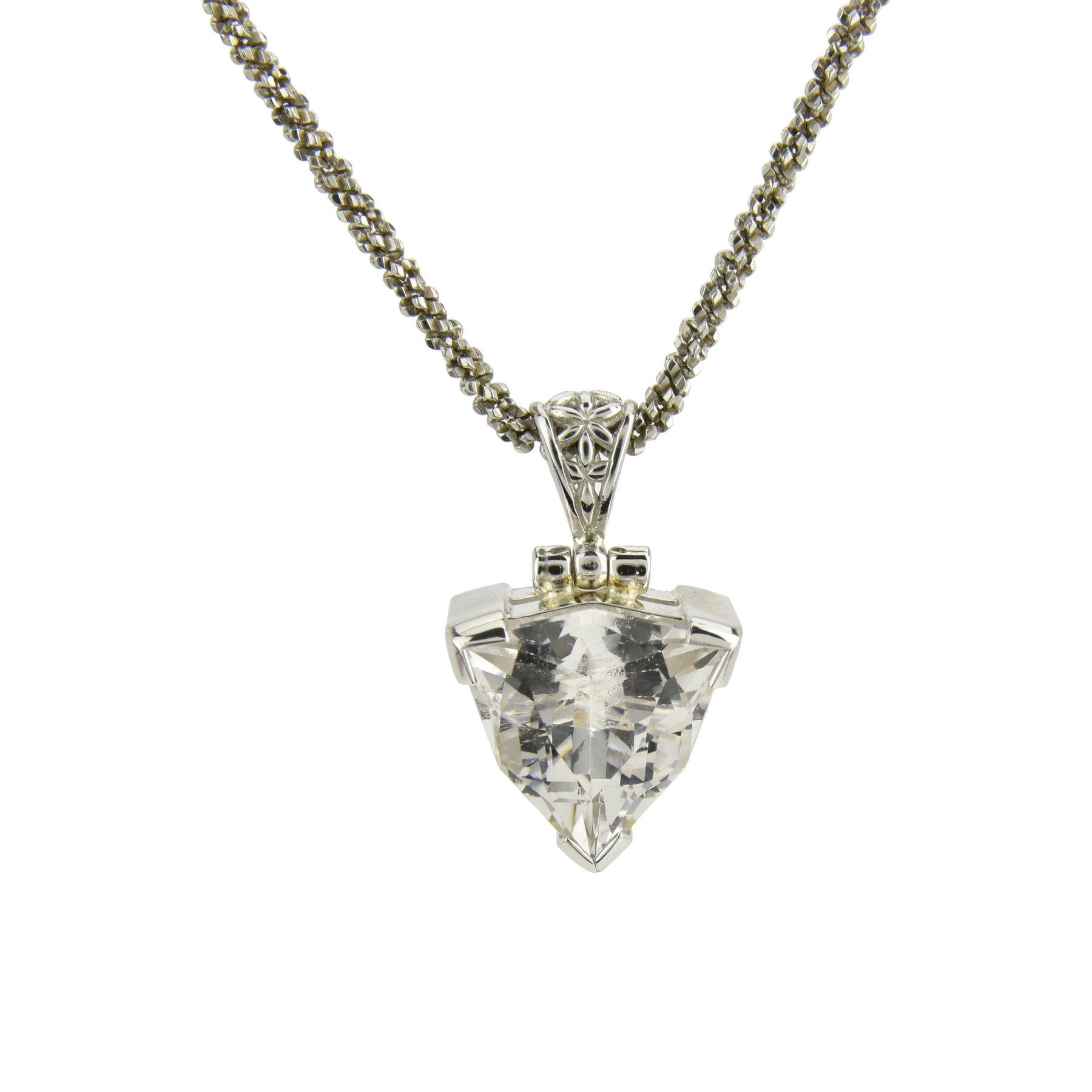 Danburite crystal pendant radiating calming energy and light codes, known as a powerful healing stone for emotional blockages, spiritual growth, and higher chakras.